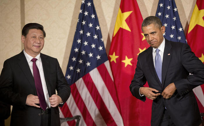 Preşedintele chinez Xi Jinping (st) şi omologul său american Barack Obama. (Captură Foto)